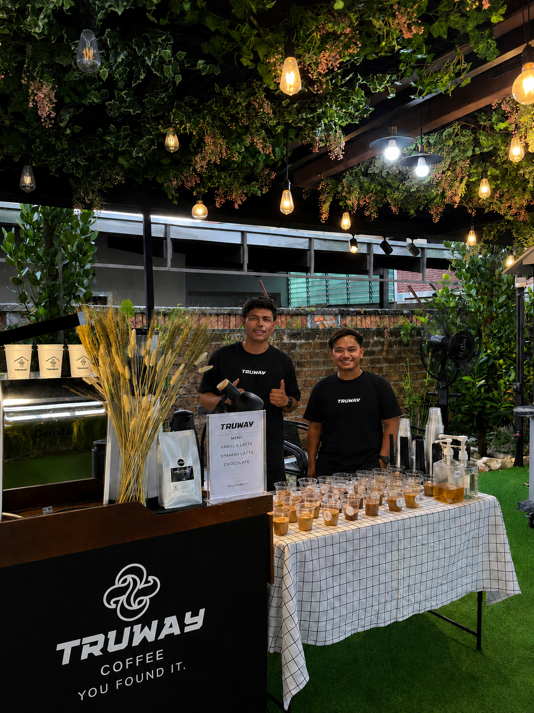 The TRUWAY Coffee team at their branded coffee booth